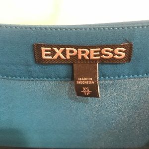 Express shirt size XS fits a medium